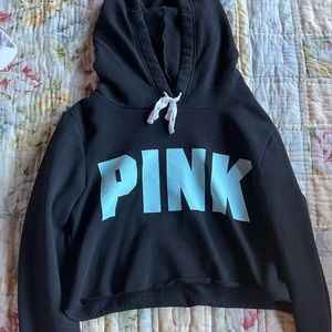 victoria’s secret cropped hoodie. light blue lettering
size S